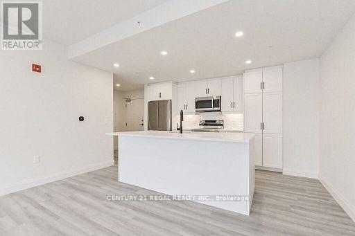 414 - 99B Farley Road, Centre Wellington, ON - Indoor Photo Showing Kitchen