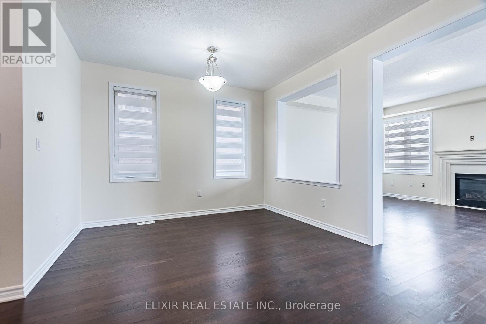 1176 Leger Way, Milton, ON - Indoor Photo Showing Other Room With Fireplace