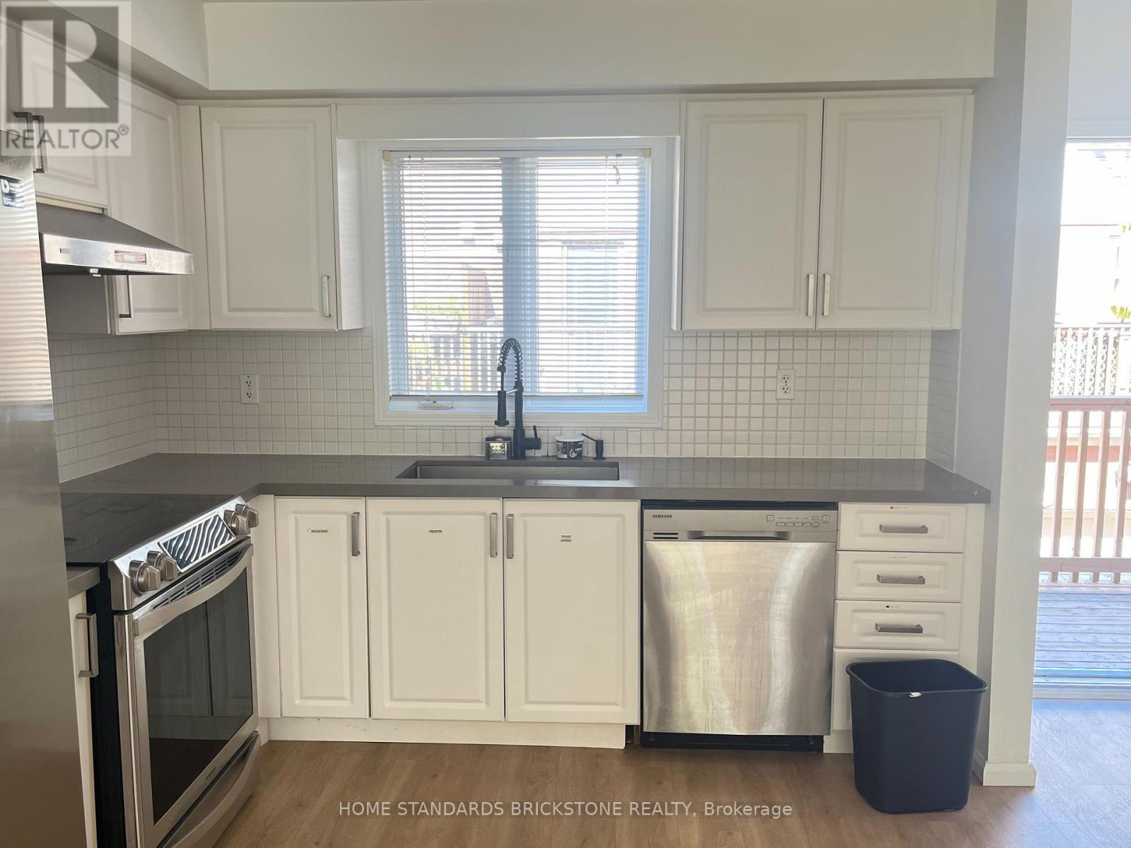 02 - 159 Tenth Street, Toronto, ON - Indoor Photo Showing Kitchen With Stainless Steel Kitchen With Double Sink With Upgraded Kitchen