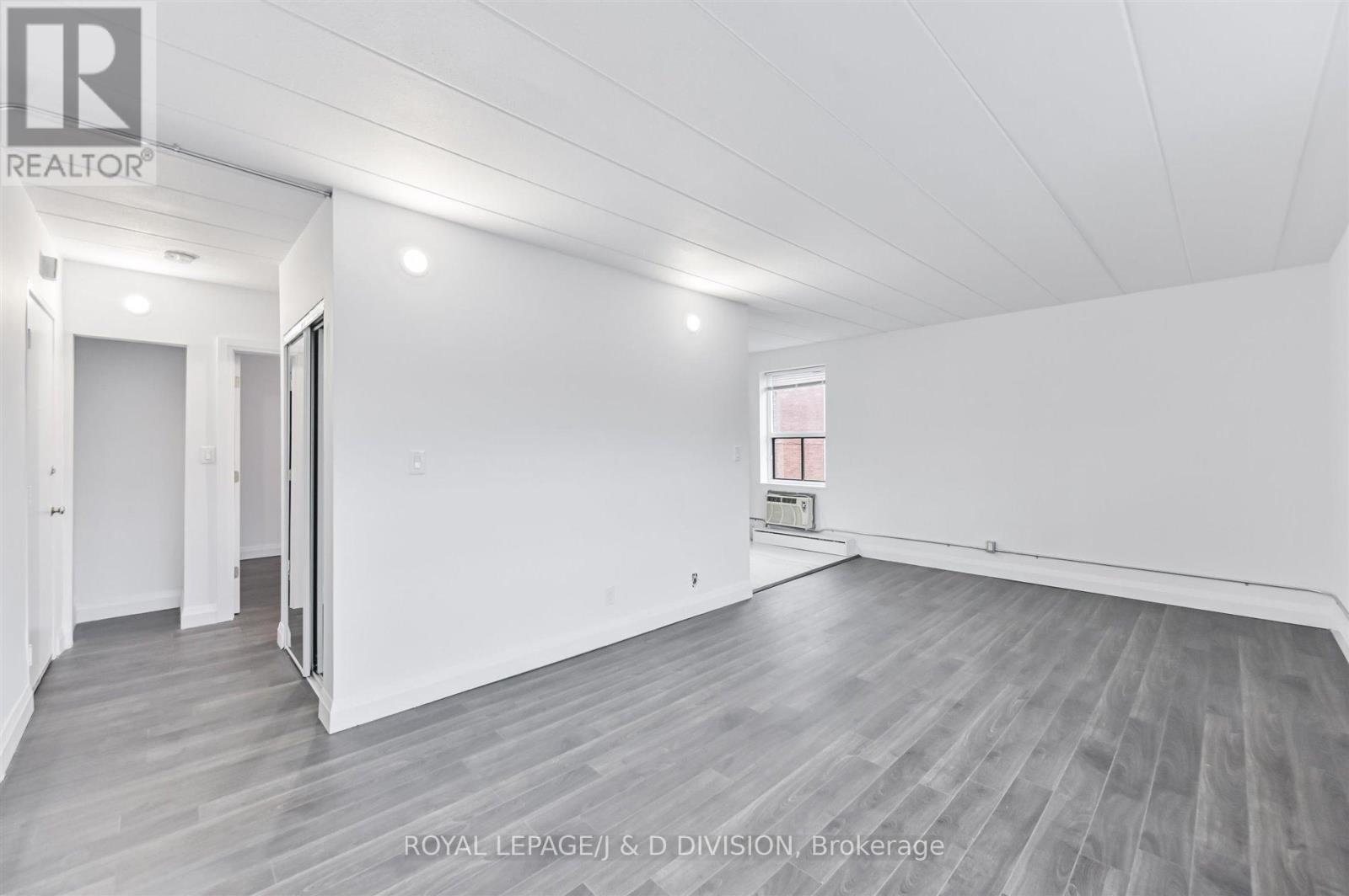Living Room - 201 - 325 Sammon Avenue, Toronto, ON - Indoor Photo Showing Other Room