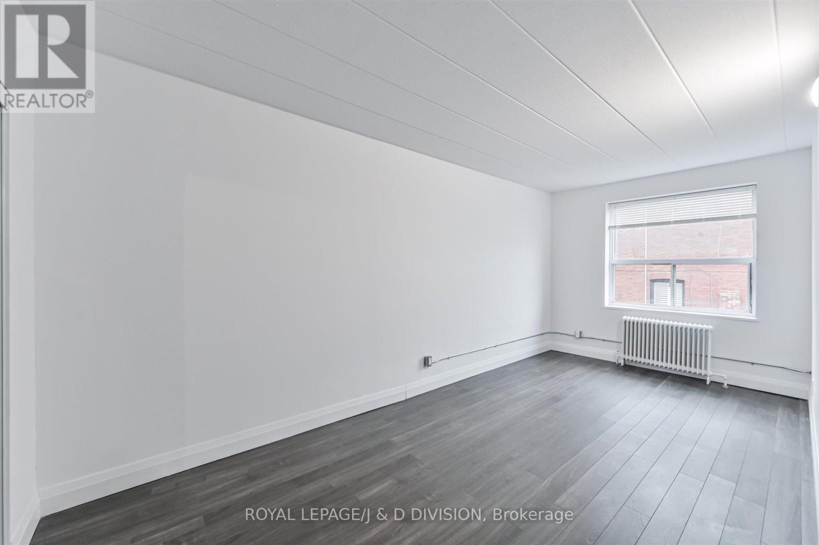Primary Bedroom - 201 - 325 Sammon Avenue, Toronto, ON - Indoor Photo Showing Other Room