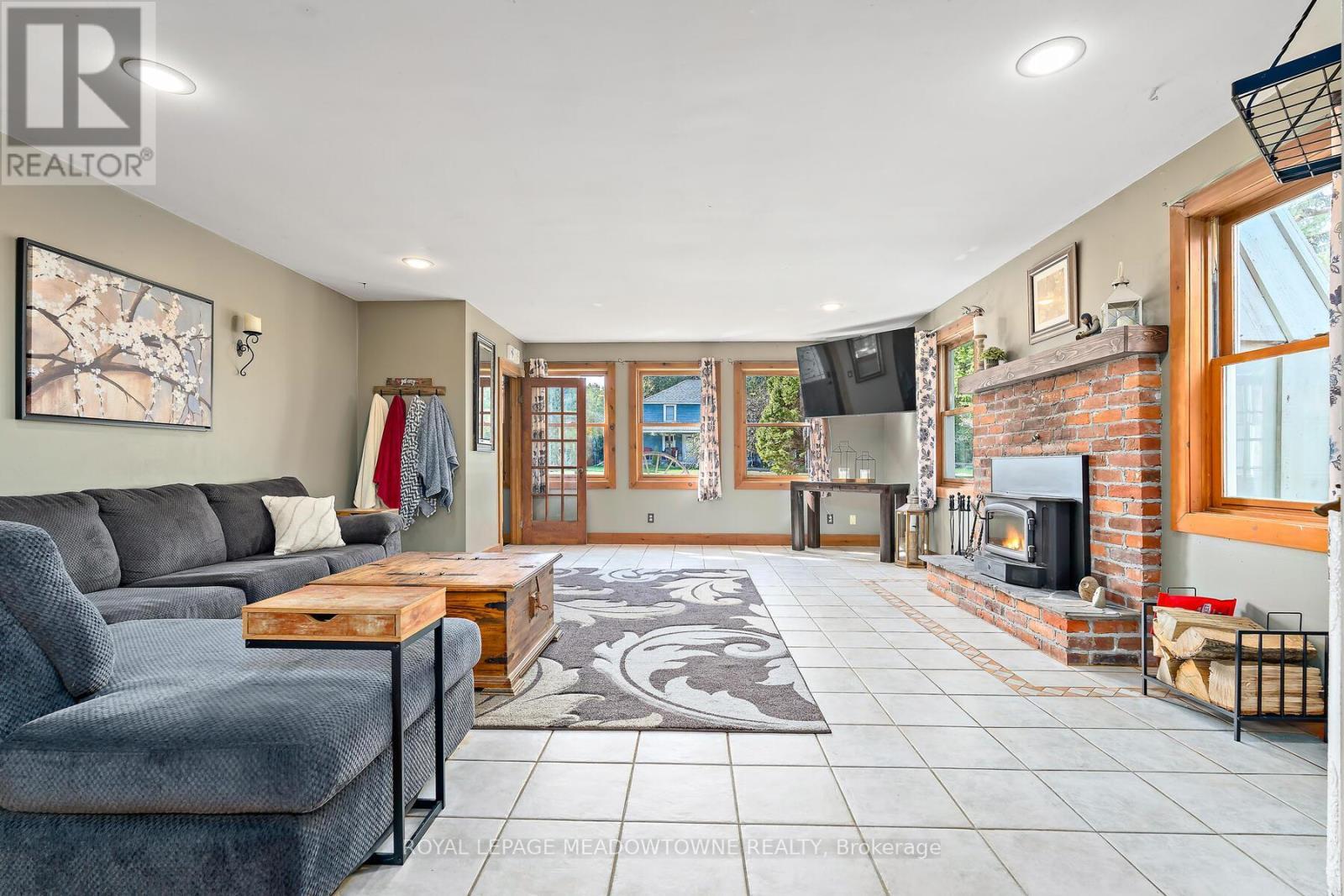Living Room - 9201 24 Side Road, Erin, ON - Indoor Photo Showing Living Room With Fireplace