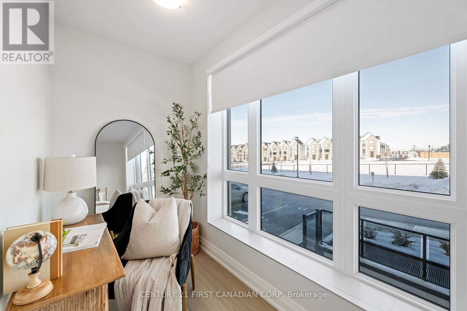 2nd bedroom nook - 203 - 1560 Upper West Avenue, London South (South B), ON - Indoor With Fireplace