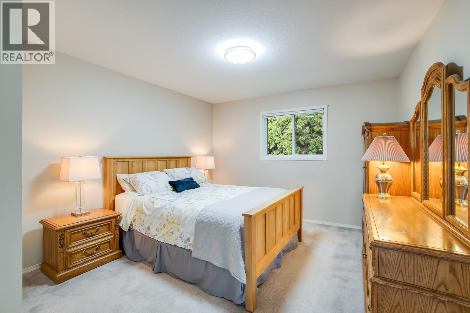 2nd bedrooms - 1650 Highland Drive N, Kelowna, BC - Indoor Photo Showing Bedroom