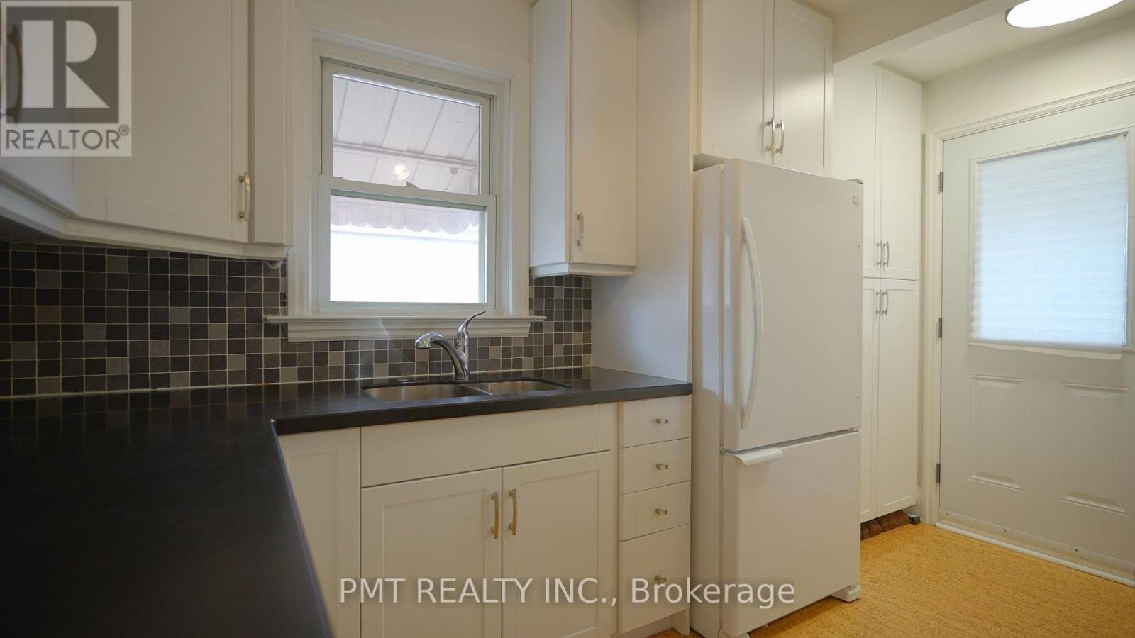 103 Yardley Avenue, Toronto, ON - Indoor Photo Showing Kitchen With Double Sink