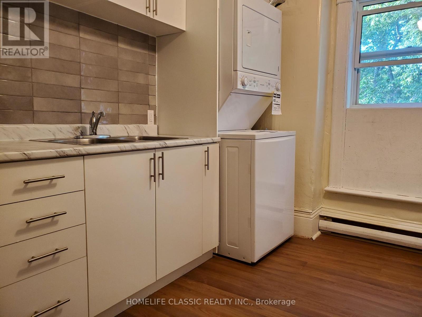 2 - 396 Simcoe Street, Brock, ON - Indoor Photo Showing Laundry Room