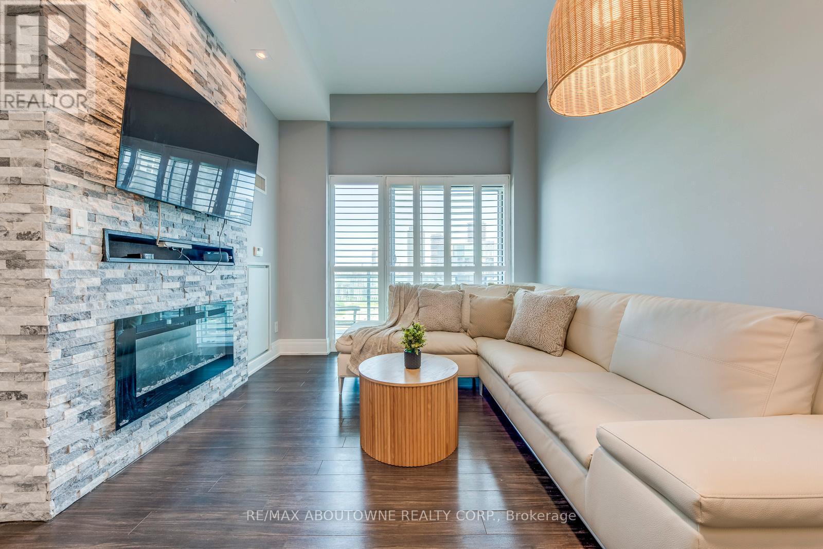 2524 - 165 Legion Road N, Toronto, ON - Indoor Photo Showing Living Room With Fireplace