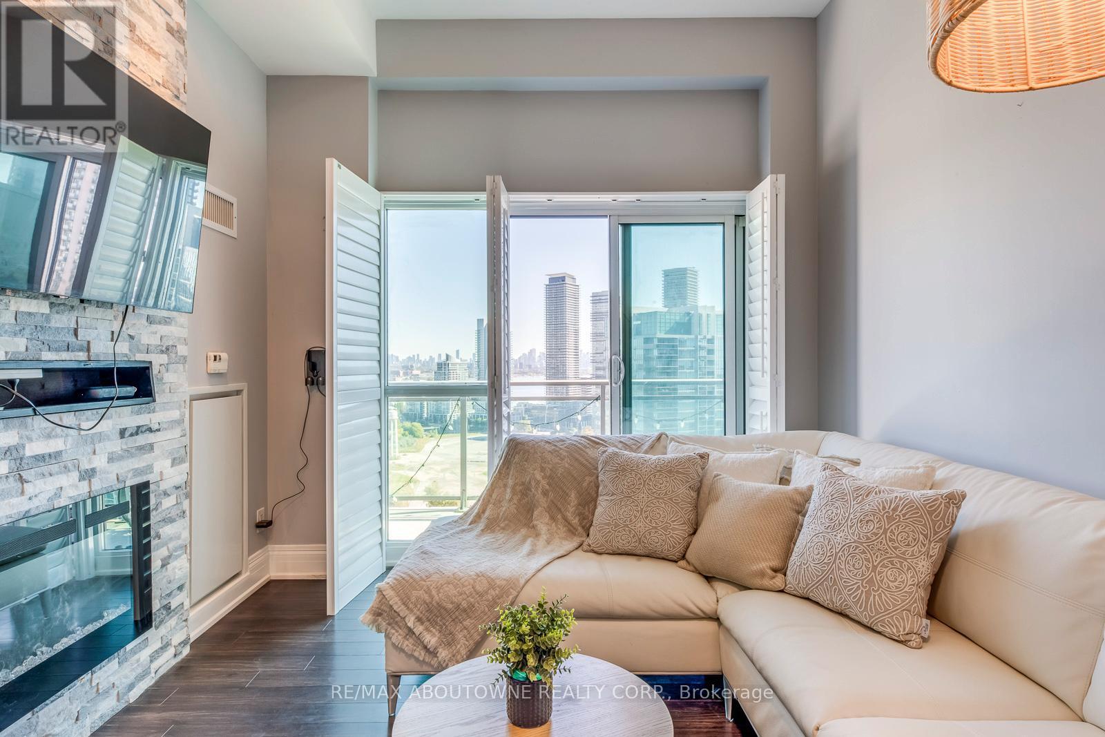 2524 - 165 Legion Road N, Toronto, ON - Indoor Photo Showing Living Room With Fireplace