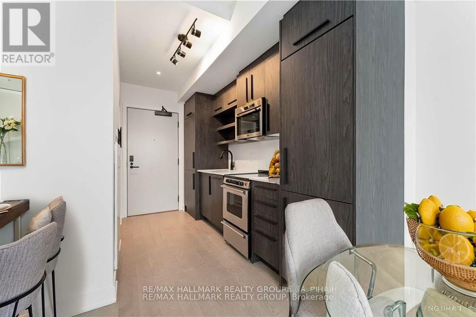 Virtually Staged Kitchen & Dining - 718 - 560 Rideau Street, Ottawa, ON - Indoor Photo Showing Kitchen