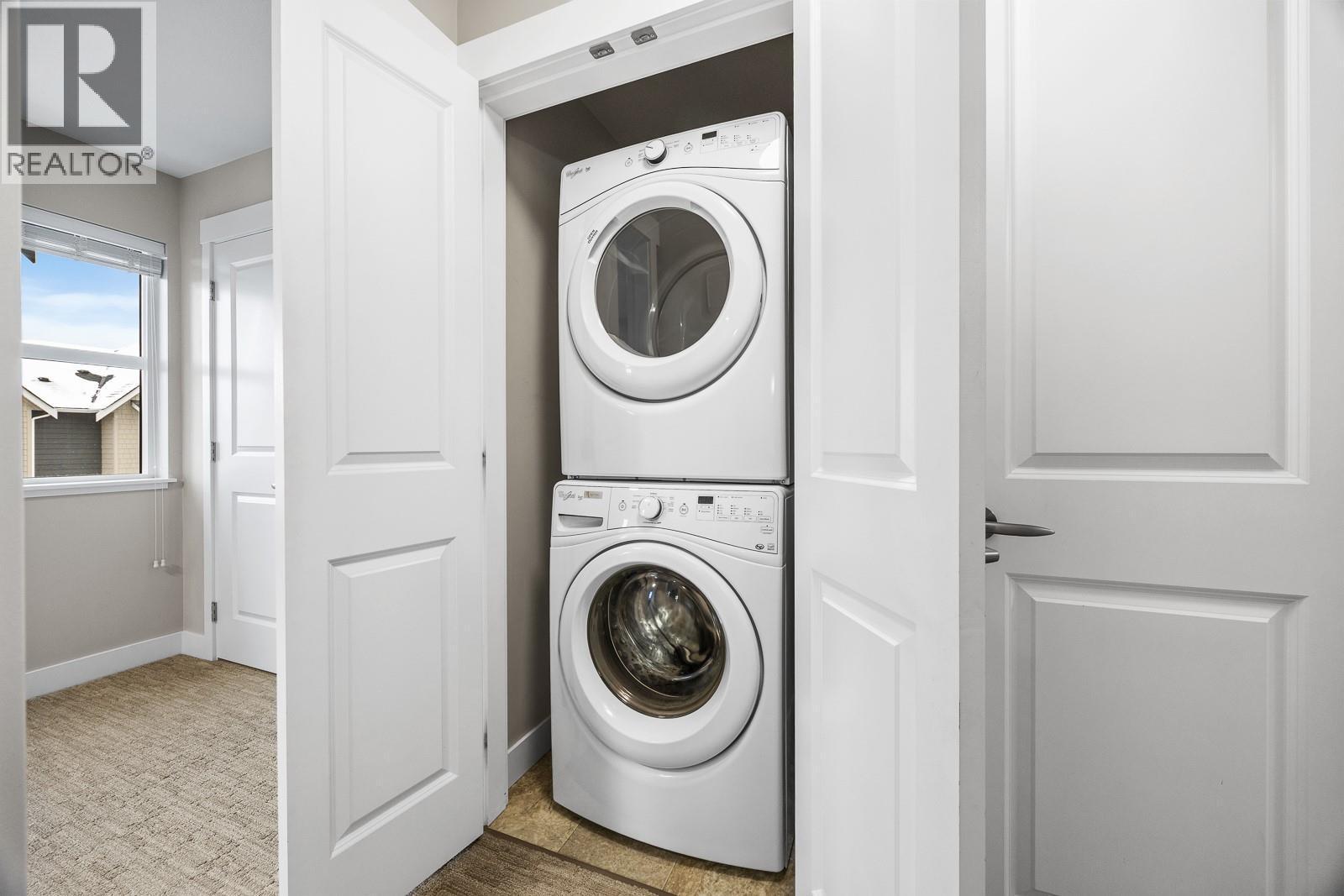 Upstairs Laundry - 2490 Tuscany Drive Unit# 54, West Kelowna, BC - Indoor Photo Showing Laundry Room