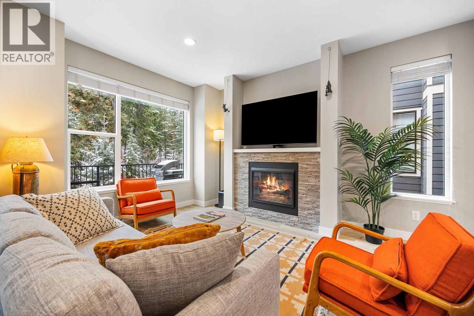 2490 Tuscany Drive Unit# 54, West Kelowna, BC - Indoor Photo Showing Living Room With Fireplace