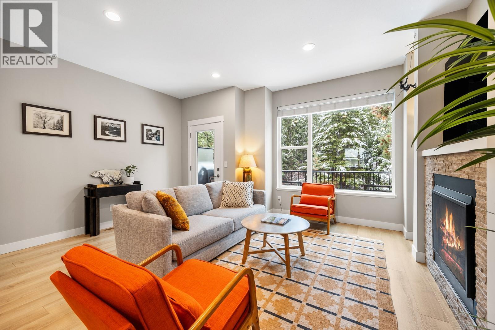 2490 Tuscany Drive Unit# 54, West Kelowna, BC - Indoor Photo Showing Living Room With Fireplace