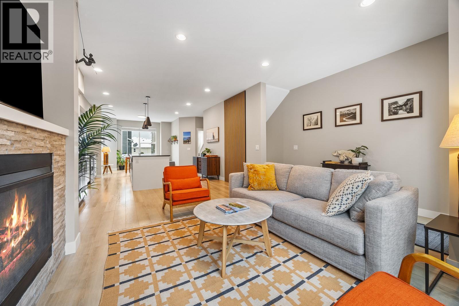 2490 Tuscany Drive Unit# 54, West Kelowna, BC - Indoor Photo Showing Living Room With Fireplace