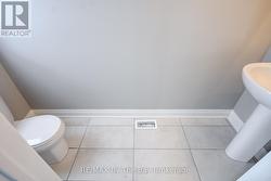 Powder Room at the entrance -