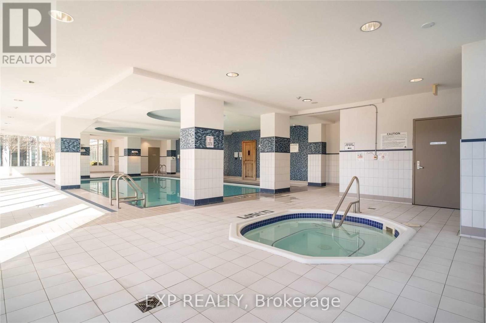 2208 - 4070 Confederation Parkway, Mississauga, ON - Indoor Photo Showing Other Room With In Ground Pool