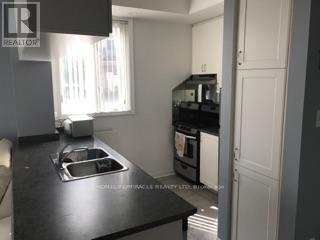 65 - 5650 Winston Churchill Boulevard, Mississauga, ON - Indoor Photo Showing Kitchen With Double Sink