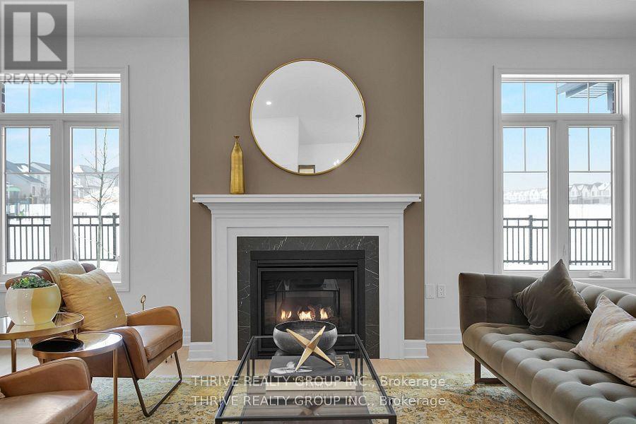 15 - 1080 Upperpoint Avenue, London South (South B), ON - Indoor Photo Showing Living Room With Fireplace