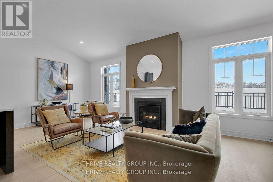 15 - 1080 Upperpoint Avenue, London South (South B), ON - Indoor Photo Showing Living Room With Fireplace