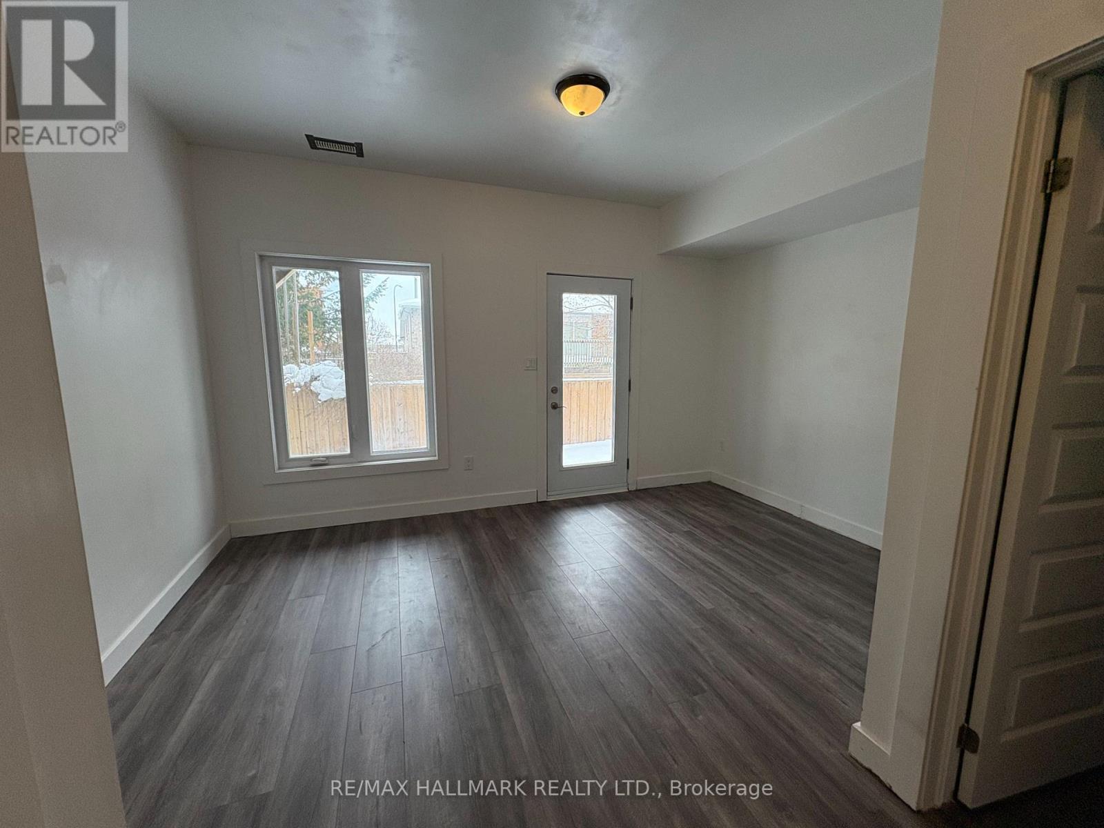 Separate room through garage - 21 - 540 Essa Road, Barrie, ON - Indoor Photo Showing Other Room