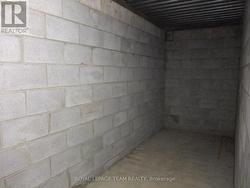 Cold storage under front entrance. -