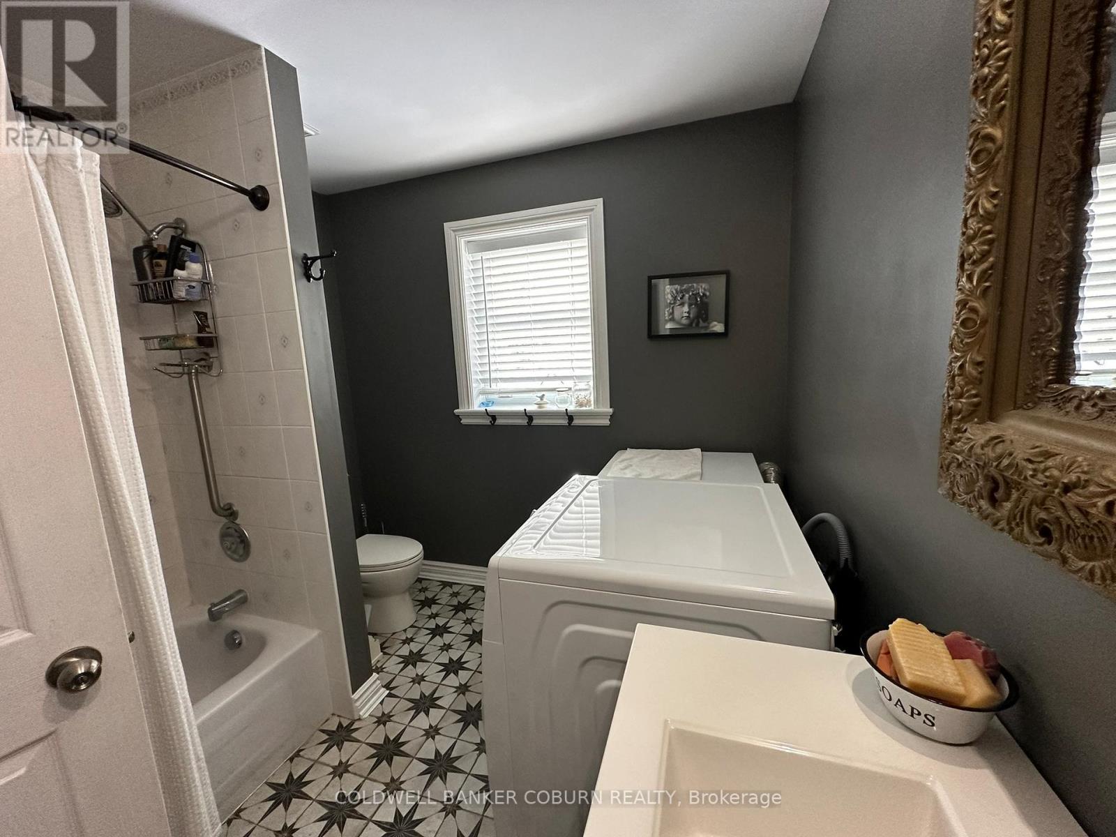 Primary bedroom and laundry on main level. - 628 Pittston Road, Edwardsburgh/Cardinal, ON - Indoor