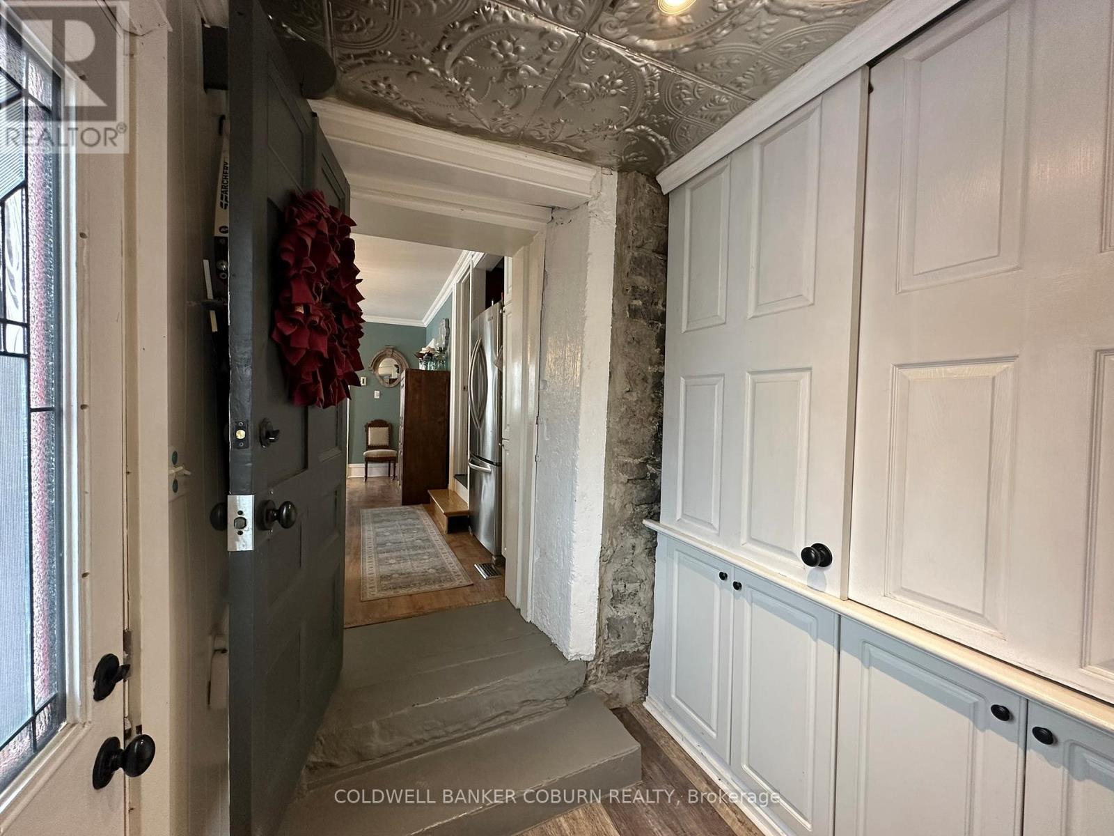 Entrance between house and garage. - 628 Pittston Road, Edwardsburgh/Cardinal, ON - Indoor Photo Showing Other Room