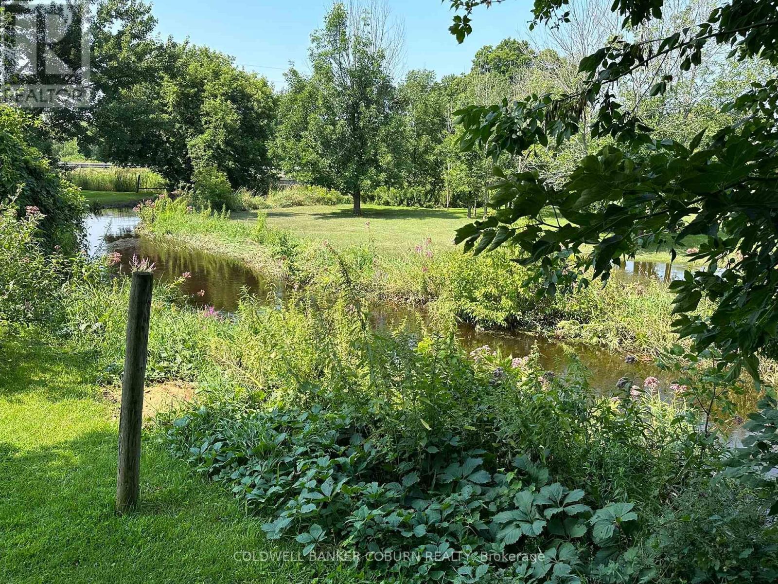 Peaceful spaces with perennial gardens and a creek - 628 Pittston Road, Edwardsburgh/Cardinal, ON - Outdoor