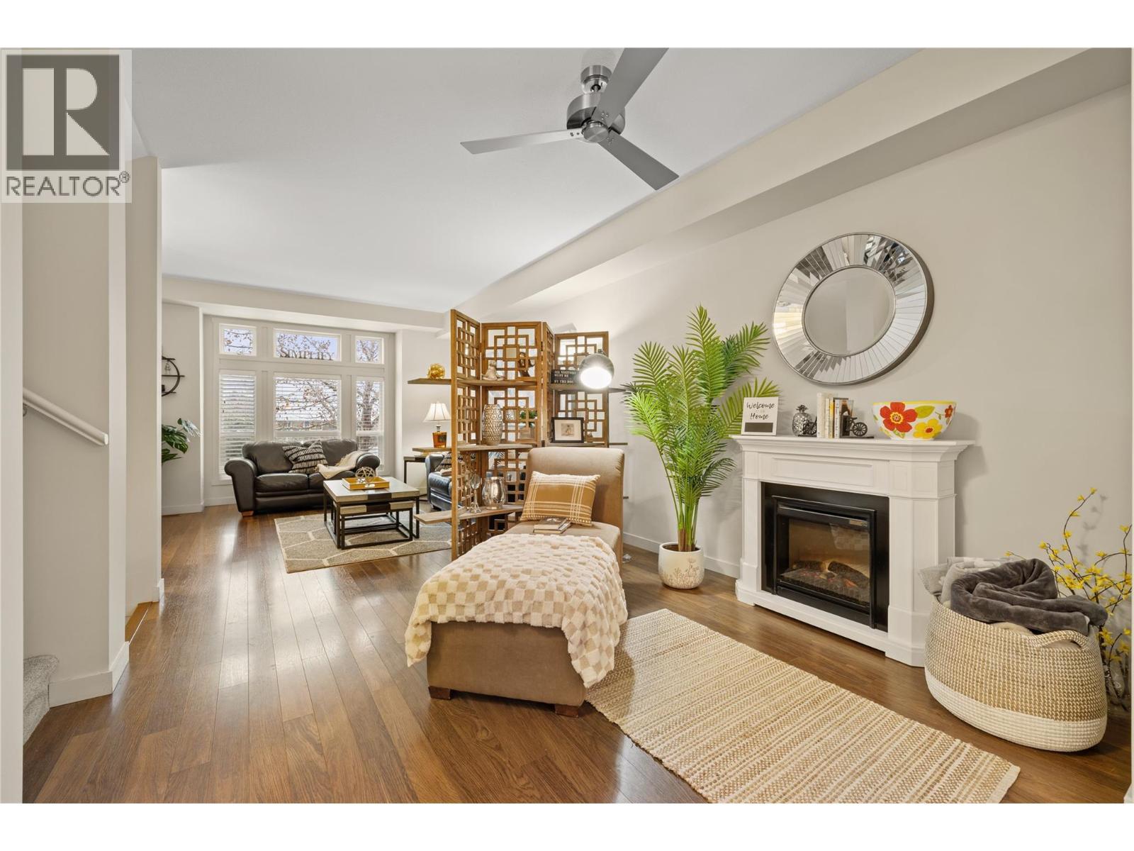 5451 South Perimeter Way, Kelowna, BC - Indoor Photo Showing Living Room With Fireplace