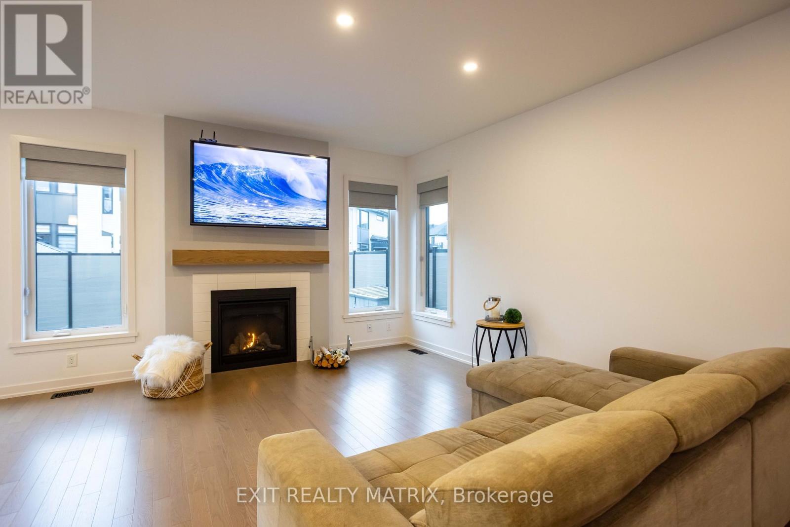 6487 Renaud Road, Ottawa, ON - Indoor Photo Showing Living Room With Fireplace