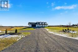 Landscaping, including grass and flower beds/trees -