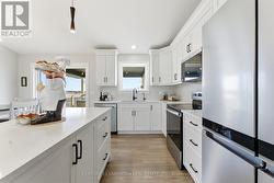 Plenty of cabinetry and high-end appliances -