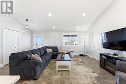 Front entry and closet into sitting area -