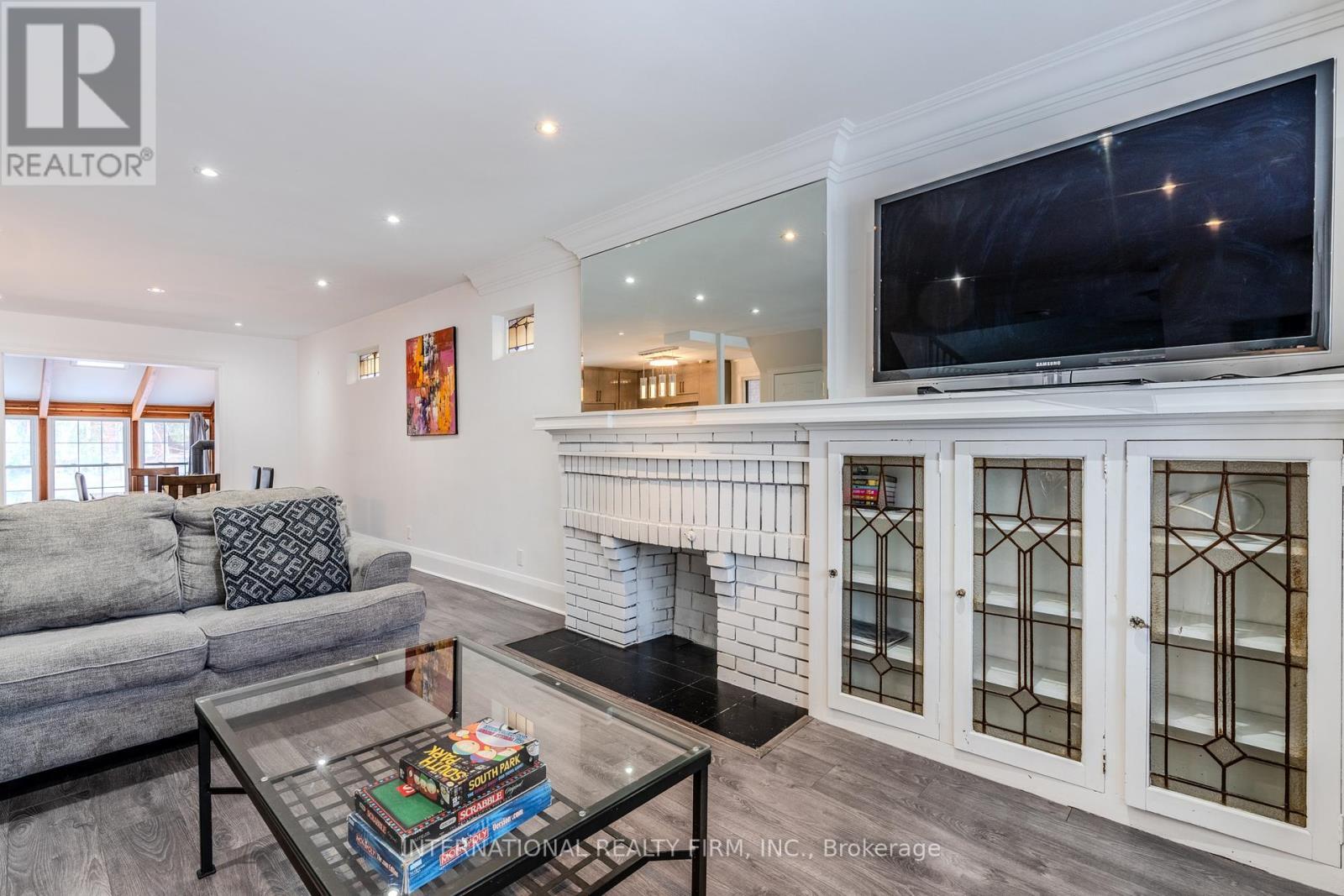 Mainsecondfloors - 47 Maxwell Avenue, Toronto, ON - Indoor Photo Showing Living Room With Fireplace