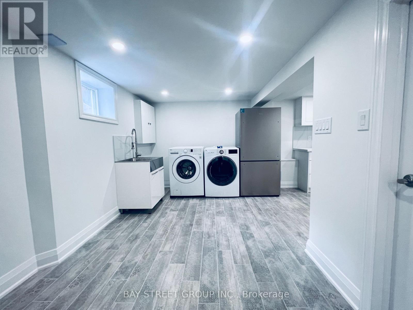 Bsmt - 1347 Victoria Park Avenue, Toronto, ON - Indoor Photo Showing Laundry Room