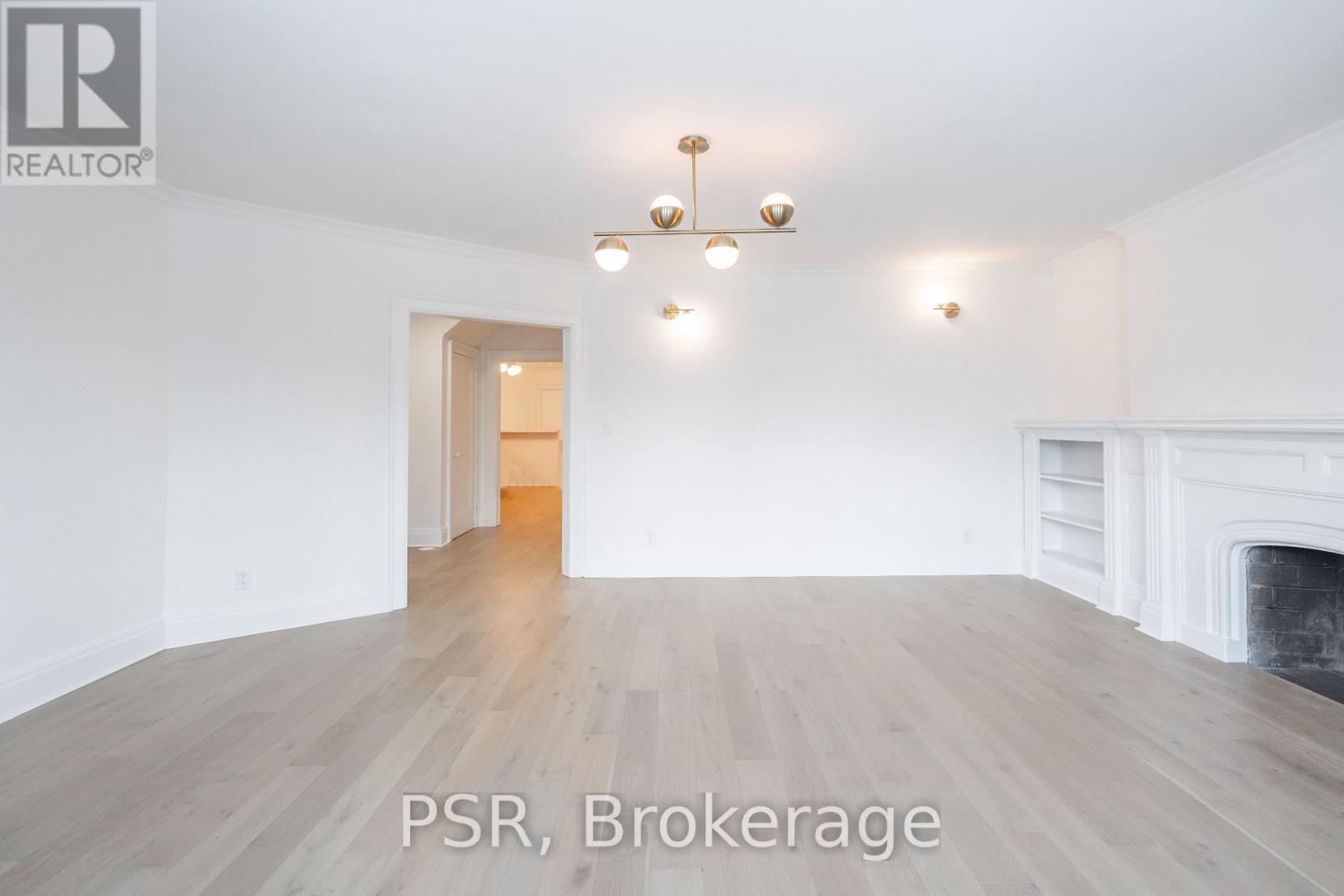 25 Coulson Avenue, Toronto, ON - Indoor With Fireplace