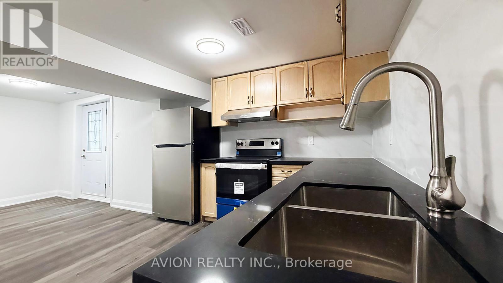 7 Heaslip Terrace, Toronto, ON - Indoor Photo Showing Kitchen With Double Sink