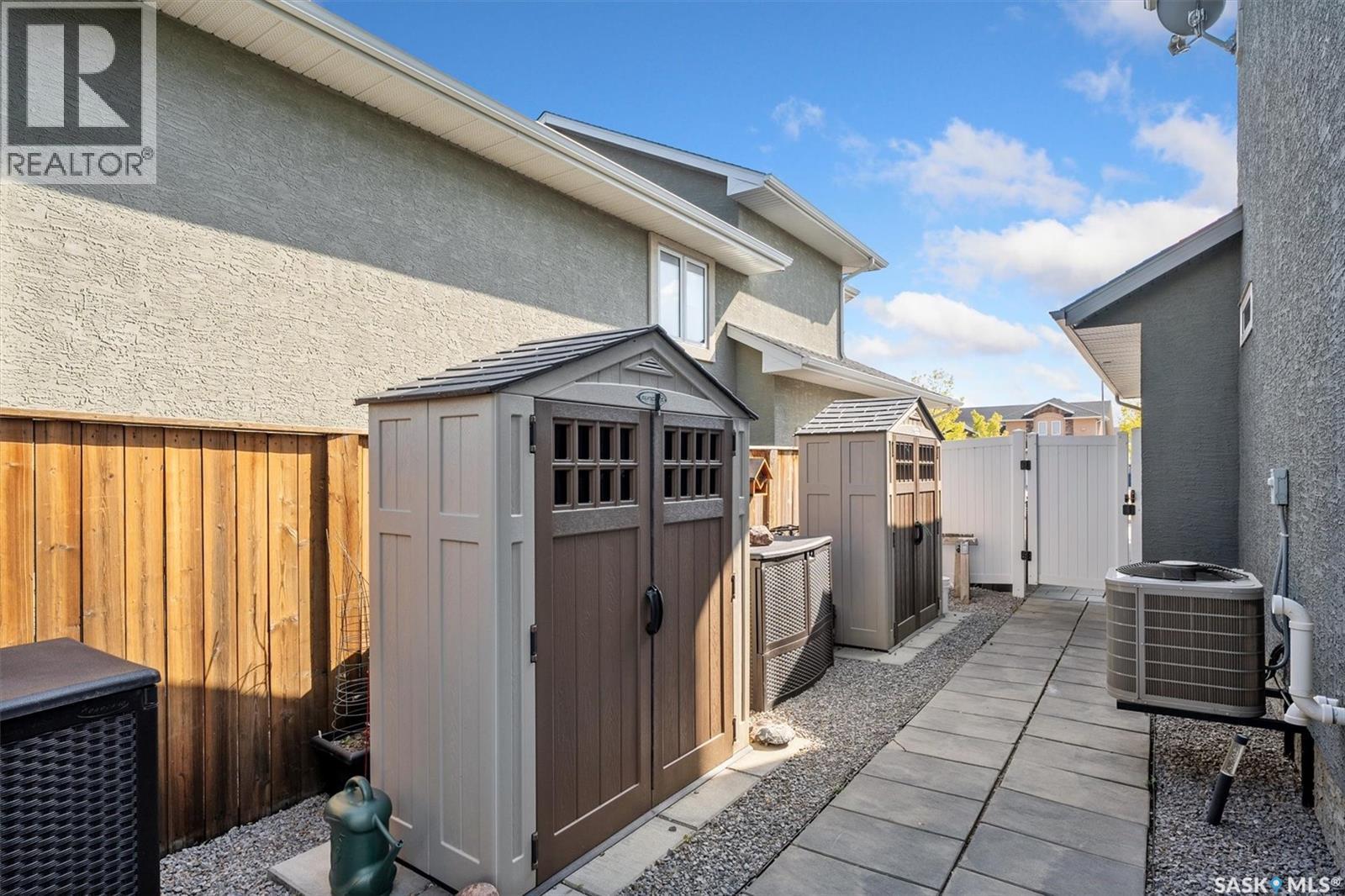 210 Clubhouse Boulevard, Warman, SK - Outdoor With Exterior