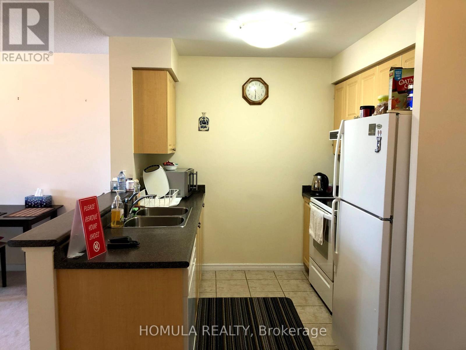 415 - 3650 Kingston Road, Toronto, ON - Indoor Photo Showing Kitchen With Double Sink