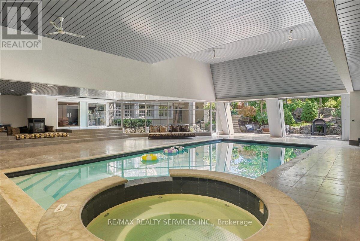 Jacuzzi with water feature. - 574 Conservation Drive, Brampton, ON - Indoor Photo Showing Other Room With In Ground Pool