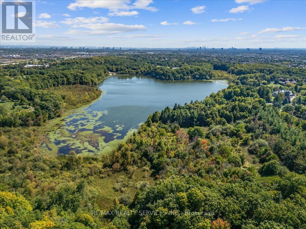 Steps to Heart Lake and surrounded by nature. - 574 Conservation Drive, Brampton, ON - Outdoor With Body Of Water With View