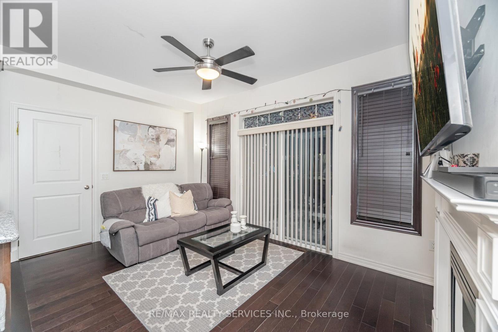 7 Dufay Road, Brampton, ON - Indoor Photo Showing Living Room