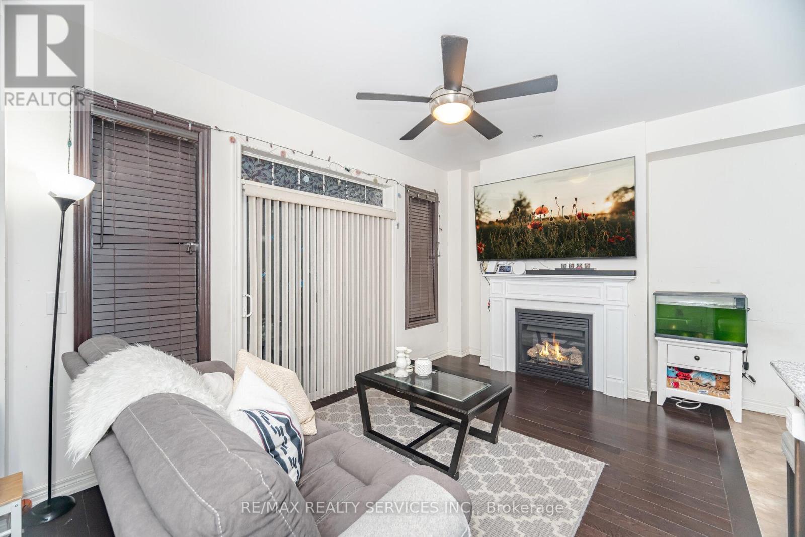 7 Dufay Road, Brampton, ON - Indoor With Fireplace
