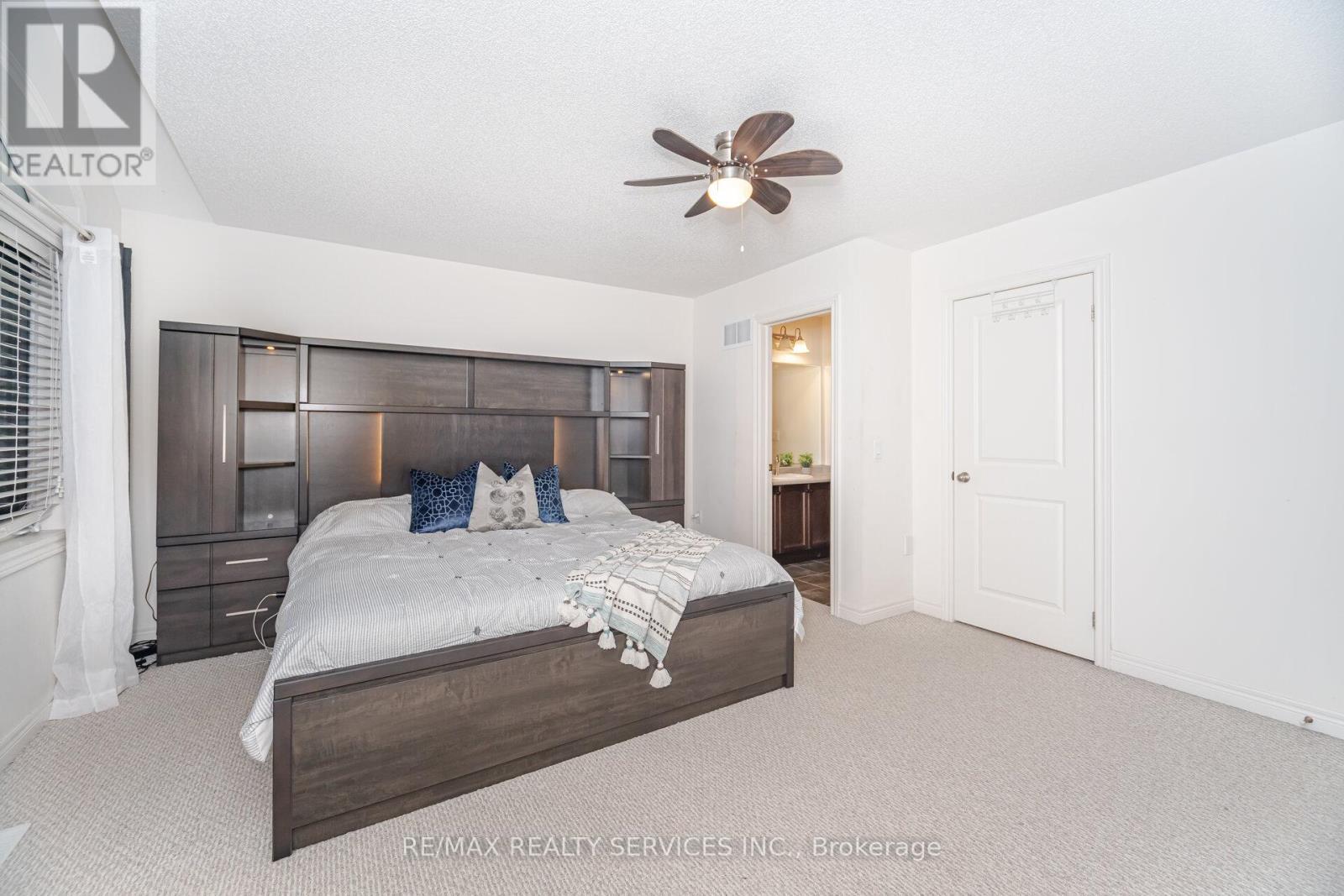 7 Dufay Road, Brampton, ON - Indoor Photo Showing Bedroom