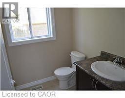 Bathroom with vanity and toilet - 55 Mooregate Crescent Unit# 3, Kitchener, ON - Indoor Photo Showing Bathroom