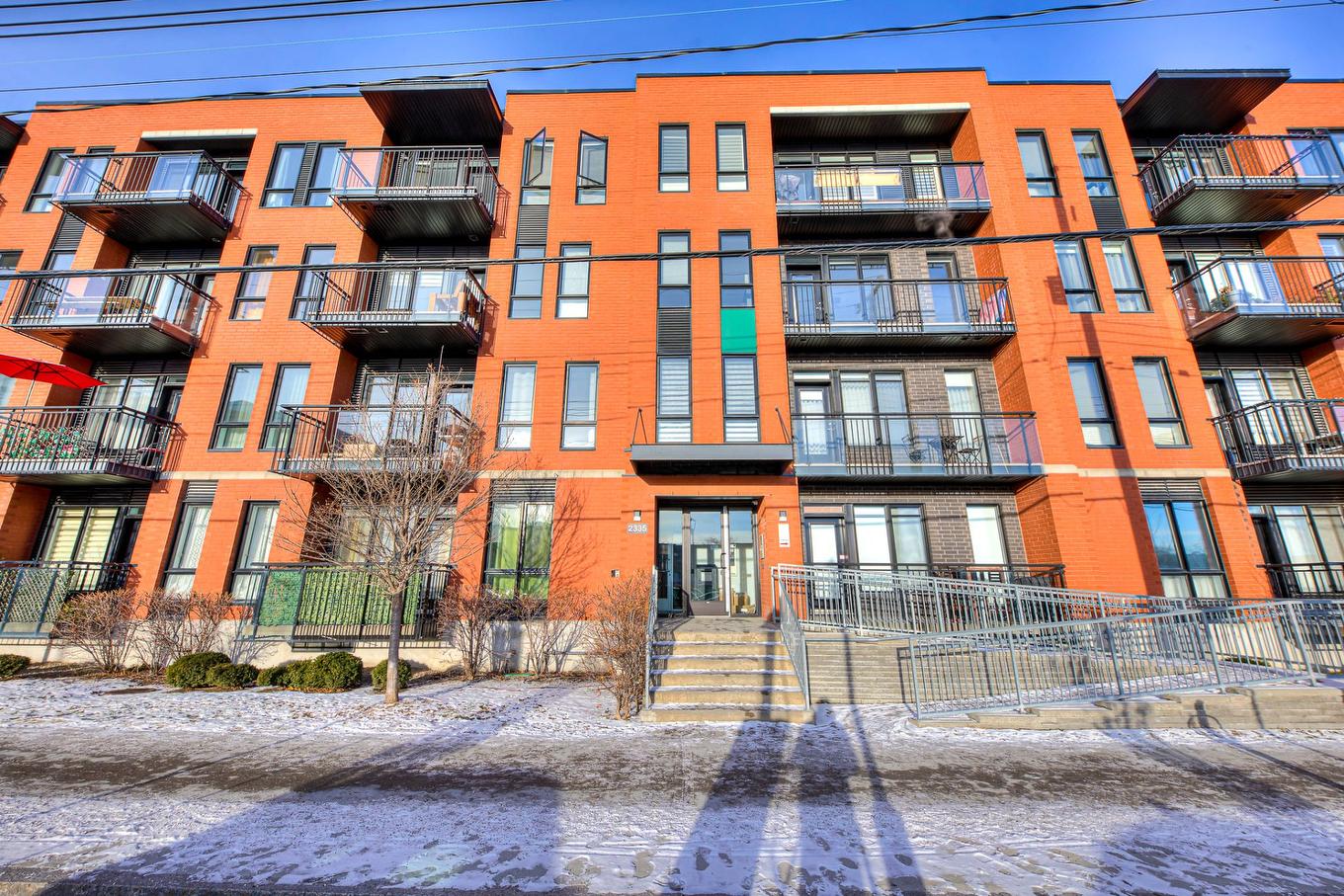 Frontage - 405-2335 Av. Bennett, Montréal (Mercier/Hochelaga-Maisonneuve), QC - Outdoor With Balcony With Facade