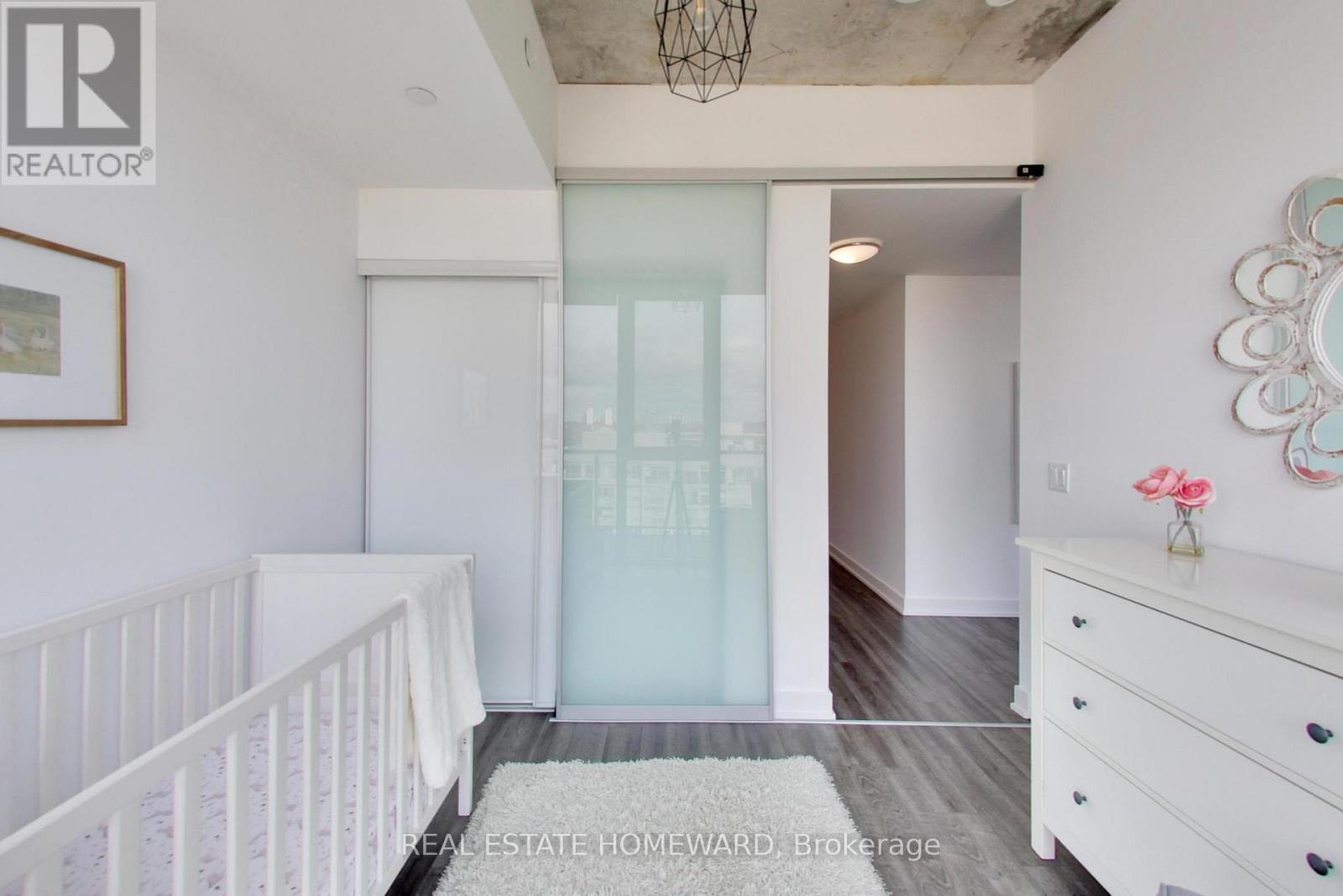 with Closet - 1113 - 30 Baseball Place, Toronto, ON - Indoor Photo Showing Bedroom