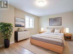 Virtually staged primary bedroom. -