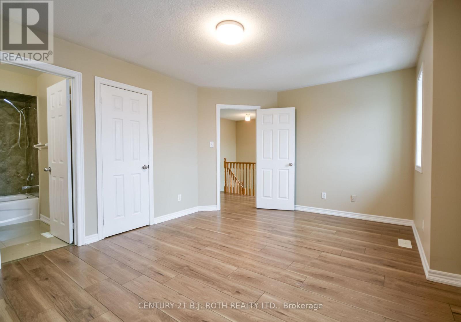 Primary bedroom with walk in closet and ensutie! - 194 Sundew Drive, Barrie, ON - Indoor Photo Showing Other Room