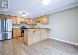 Eat in kitchen with breakfast bar. -