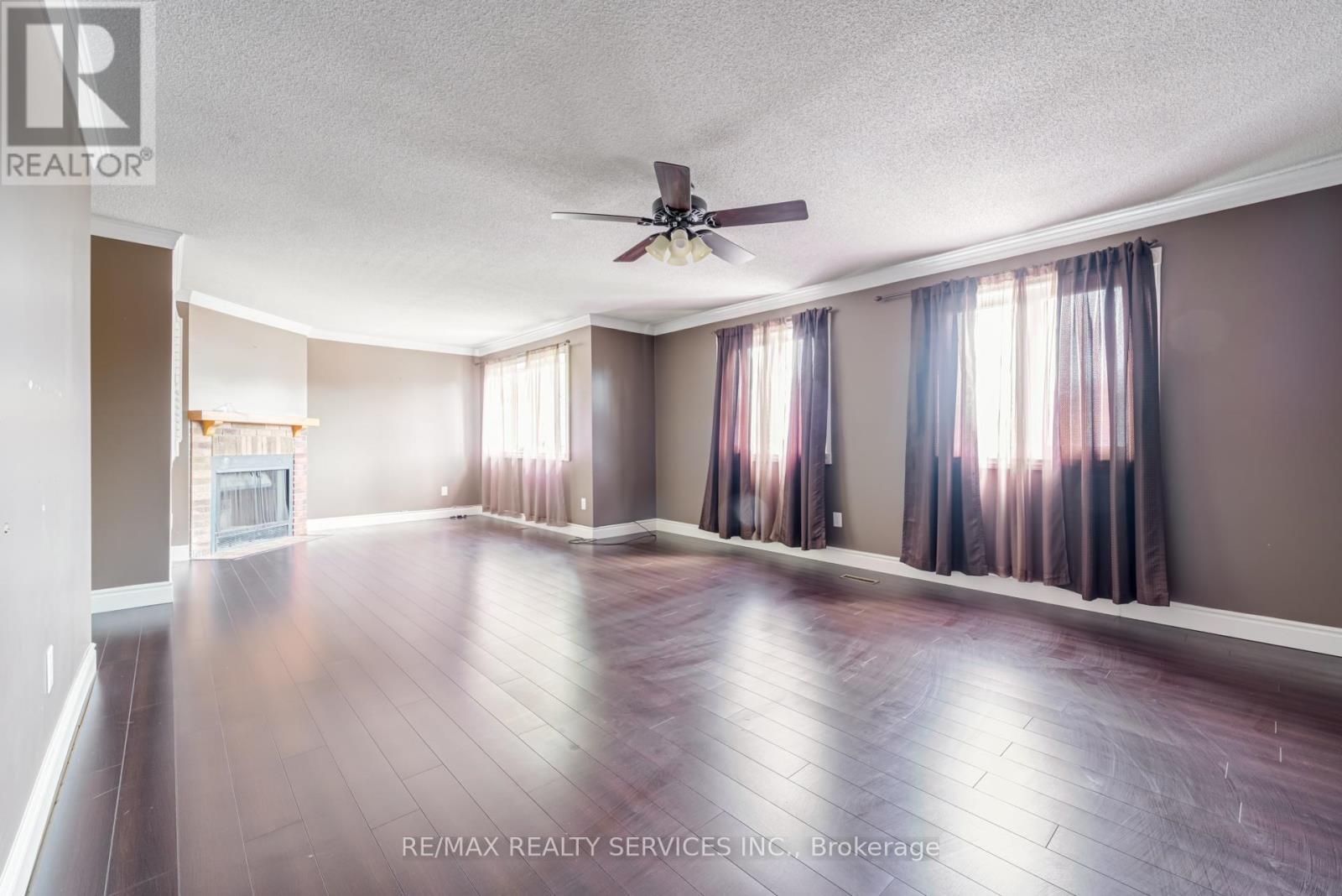 Upper - 4469 Gullfoot Circle, Mississauga, ON - Indoor With Fireplace